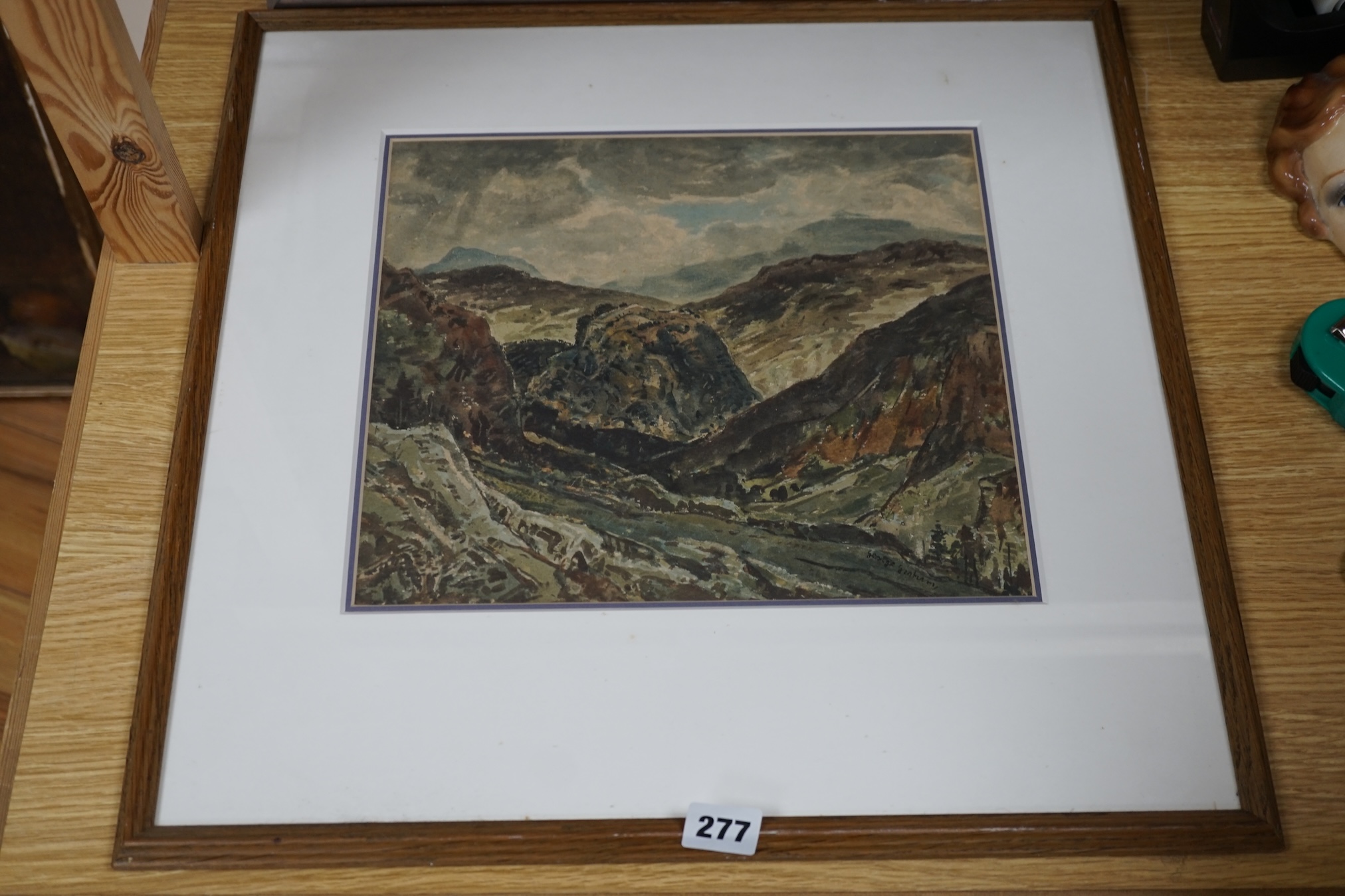 From the Studio of Fred Cuming. George Graham (1881-1949), watercolour, Mountainous landscape, signed, details verso, 27 x 31cm. Condition - fair to good